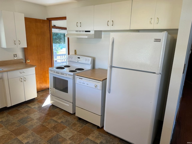 kitchen featuring white cabinets and white appliances