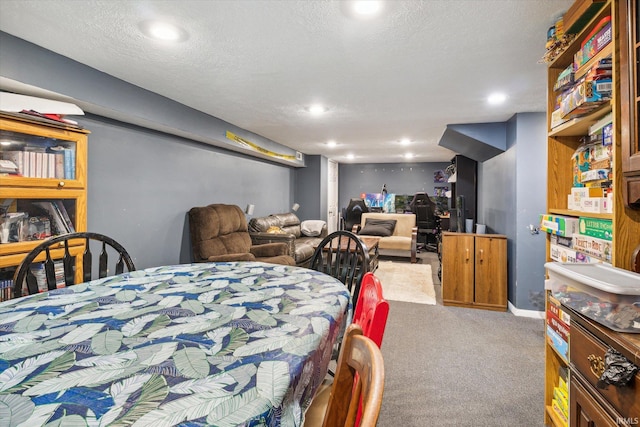 carpeted bedroom with a textured ceiling