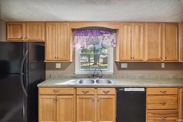 kitchen with a textured ceiling, sink, and black appliances