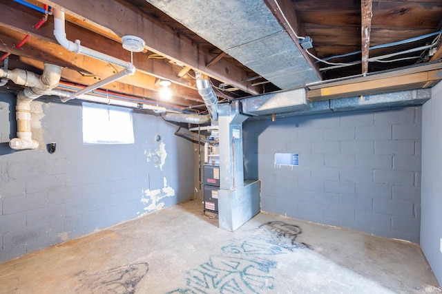 basement featuring heating unit