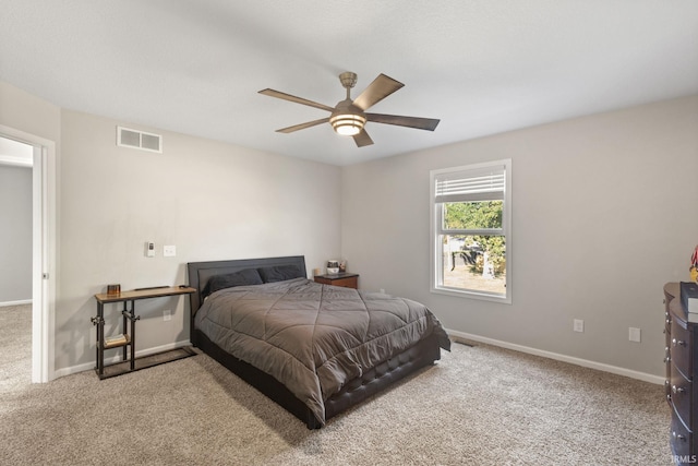 bedroom featuring ceiling fan and carpet floors