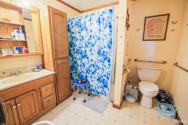 bathroom featuring a shower with curtain, vanity, toilet, and crown molding