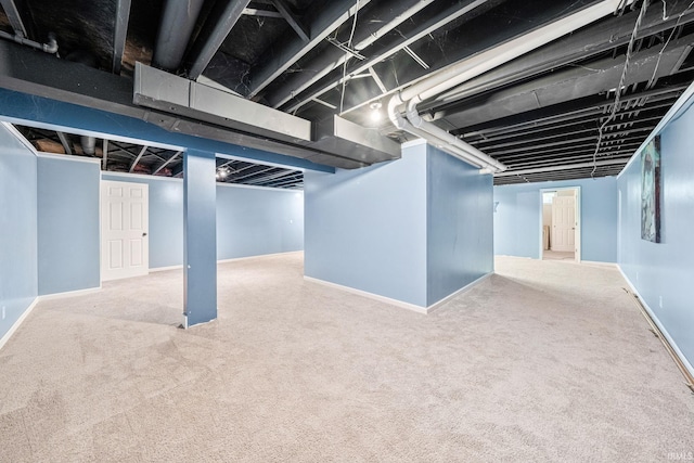 basement featuring carpet