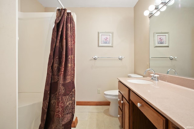 bathroom featuring walk in shower, tile patterned flooring, vanity, and toilet