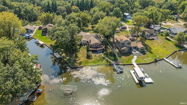 bird's eye view with a water view