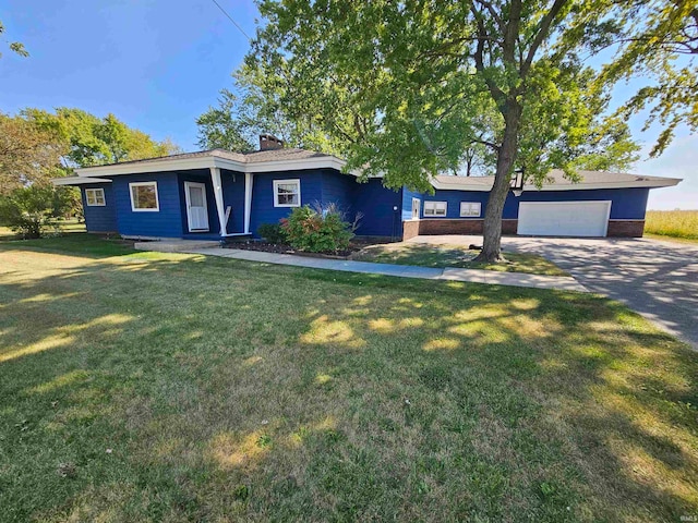 single story home with a front lawn and a garage