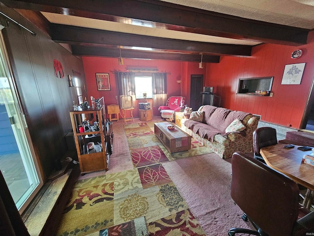 living room with beamed ceiling