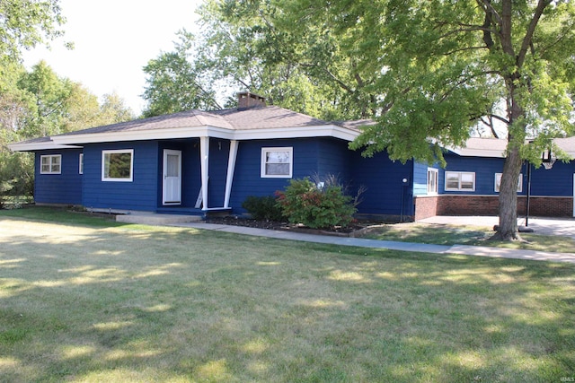 single story home featuring a front yard