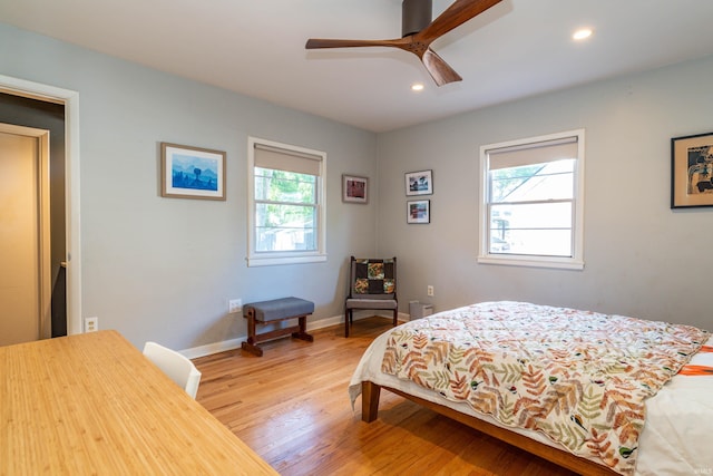 bedroom featuring ceiling fan and wood-type flooring