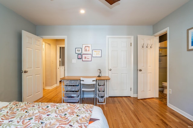 bedroom with light hardwood / wood-style flooring