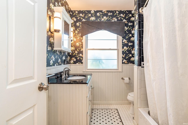 full bathroom featuring vanity, shower / tub combo, toilet, and tile patterned floors