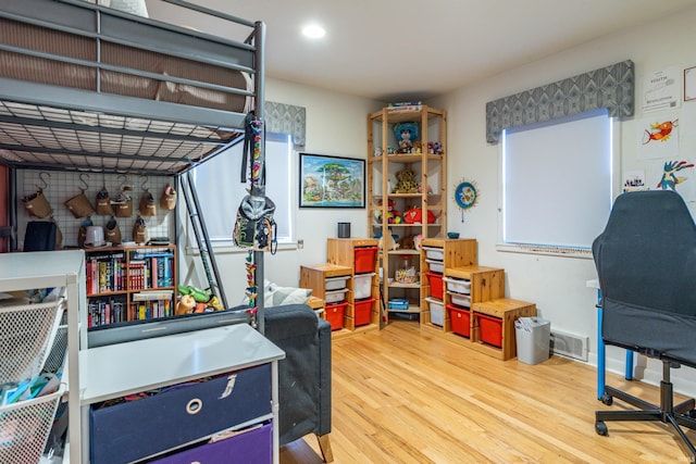 bedroom featuring wood-type flooring