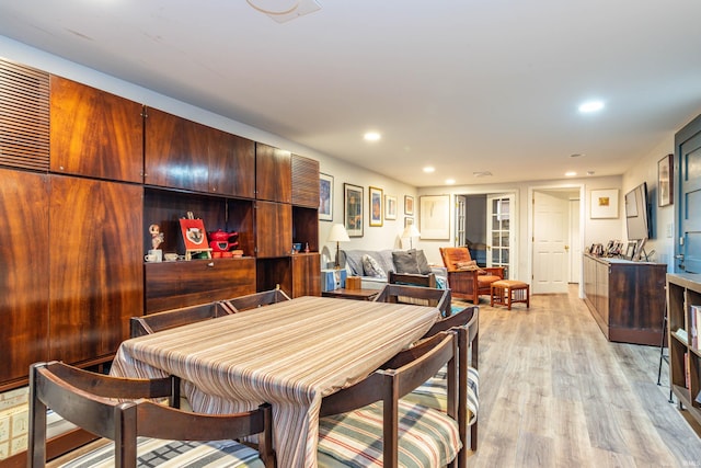 dining room featuring light hardwood / wood-style flooring