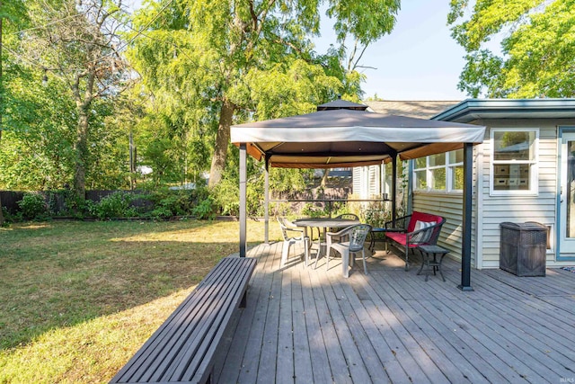 deck with a lawn and a gazebo