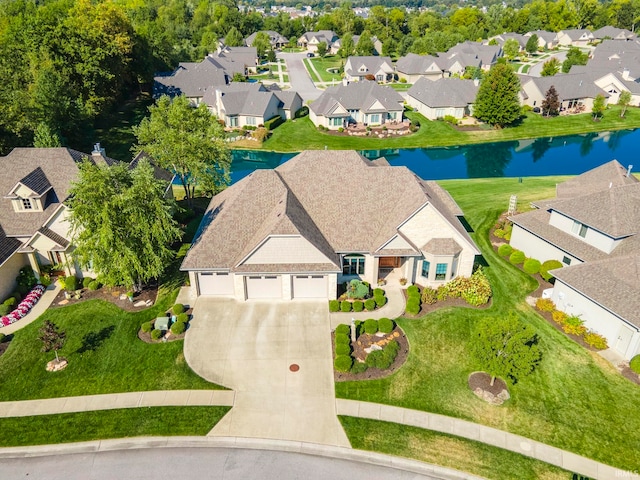 drone / aerial view featuring a water view