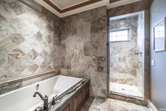 bathroom with crown molding, plenty of natural light, a bath, and a tile shower