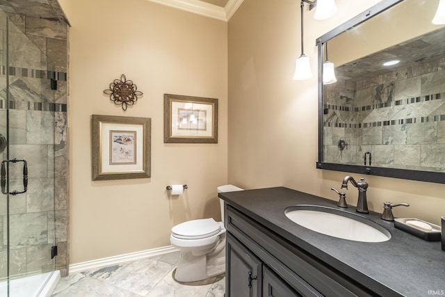 bathroom with a stall shower, vanity, crown molding, and baseboards
