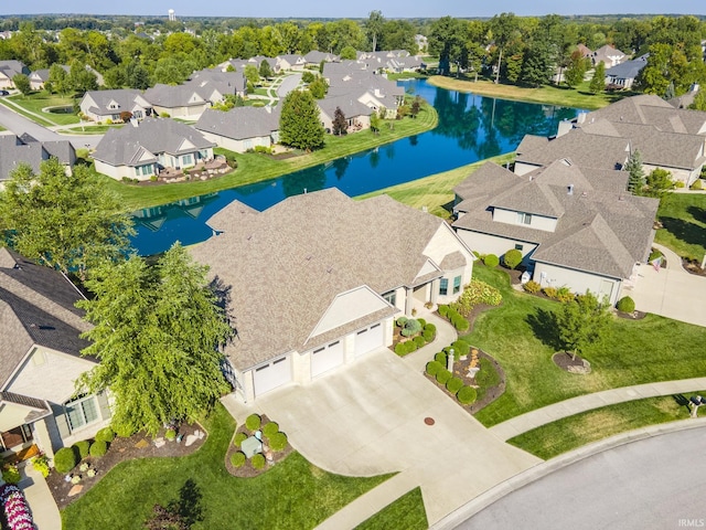 bird's eye view with a residential view and a water view