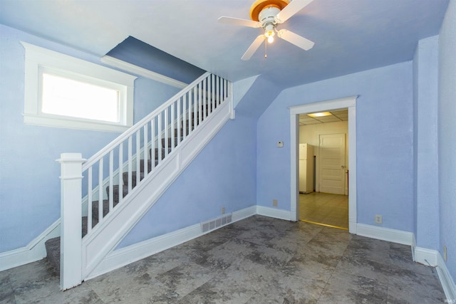 stairs with ceiling fan