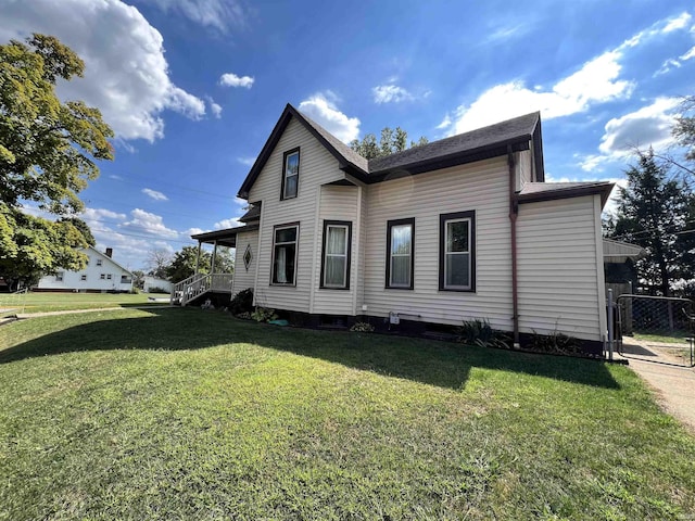 view of property exterior featuring a yard