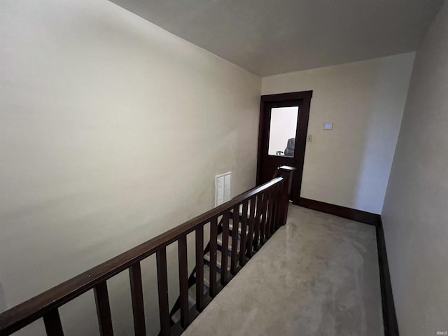 staircase with carpet flooring