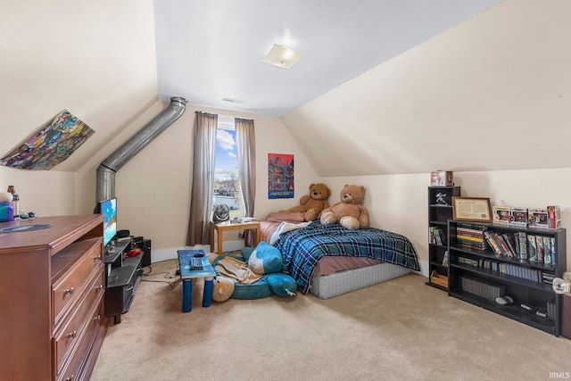 bedroom featuring light carpet and lofted ceiling