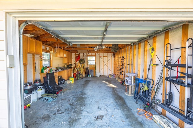 garage featuring a garage door opener