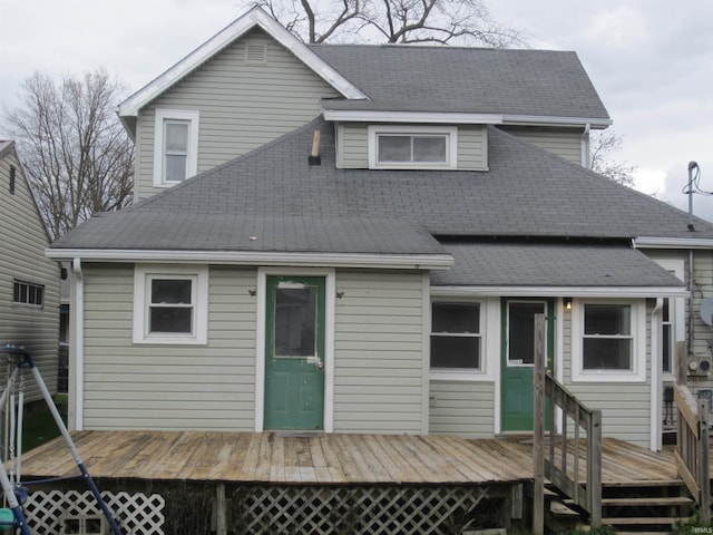 rear view of property with a deck