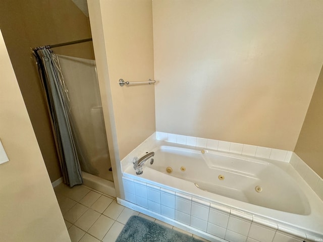 bathroom featuring shower with separate bathtub and tile patterned floors