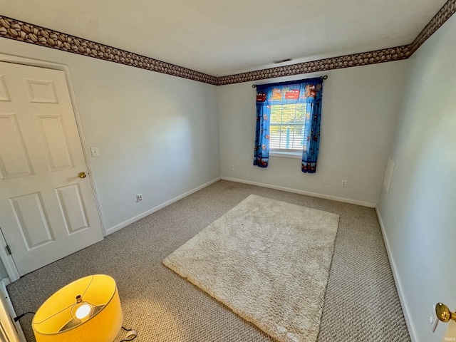 view of carpeted spare room