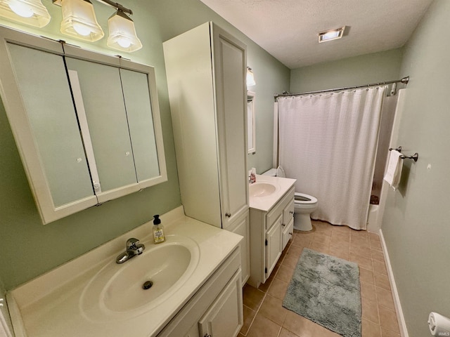 bathroom featuring vanity, a textured ceiling, tile patterned flooring, a shower with shower curtain, and toilet