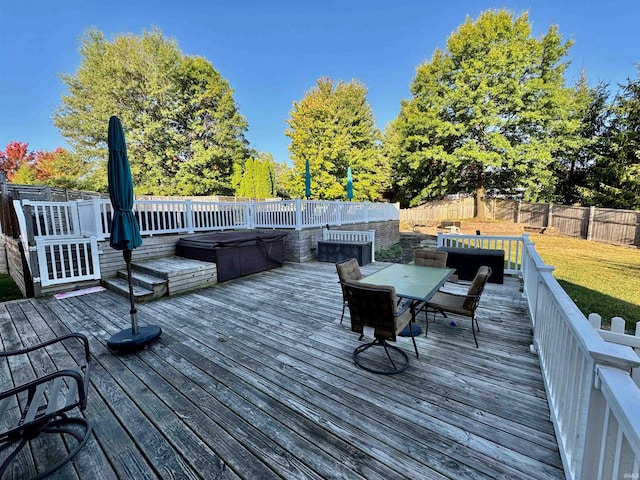 wooden terrace with a yard