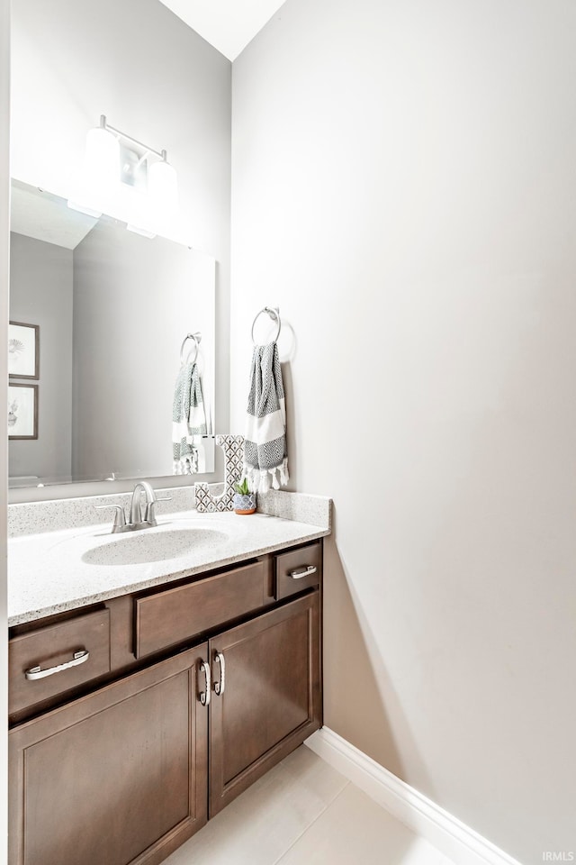 bathroom featuring tile patterned floors and vanity