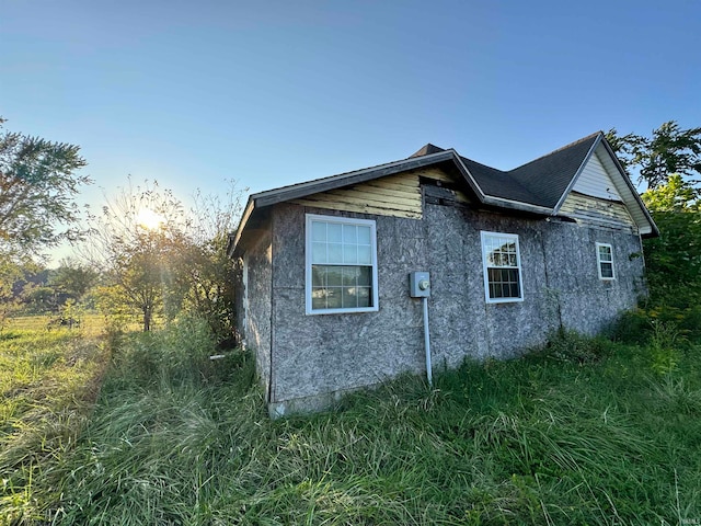 view of property exterior at dusk