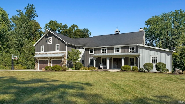 view of front of house with a front lawn and covered porch