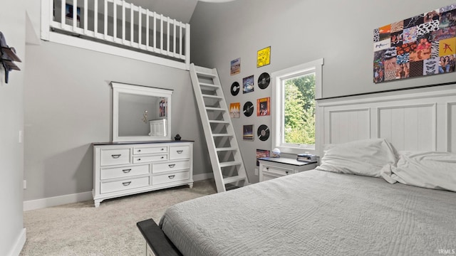 carpeted bedroom featuring vaulted ceiling