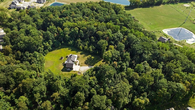 birds eye view of property with a rural view