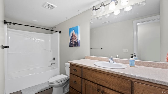 full bathroom featuring shower / tub combination, vanity, and toilet