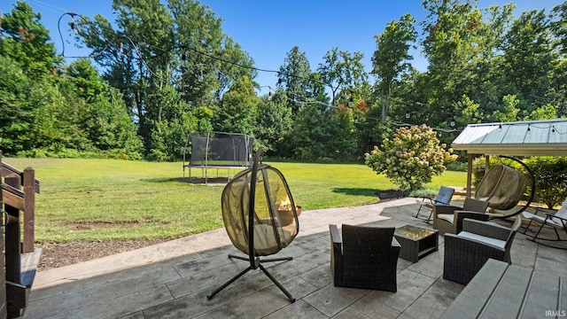 view of patio / terrace featuring a trampoline and an outdoor hangout area