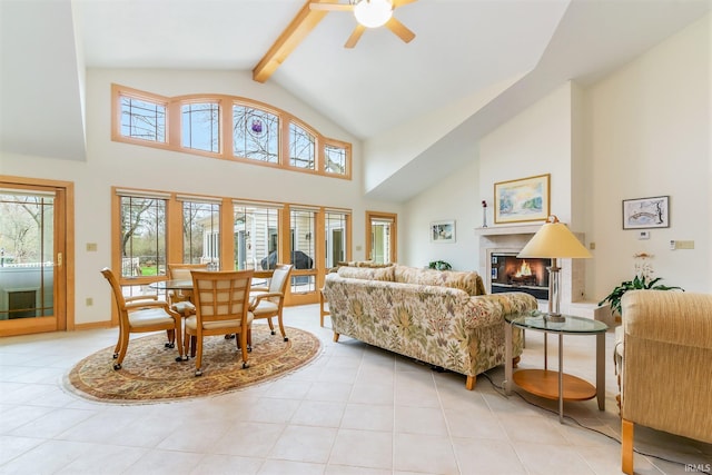 tiled living room with high vaulted ceiling, beam ceiling, and ceiling fan