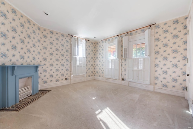 unfurnished living room featuring carpet floors