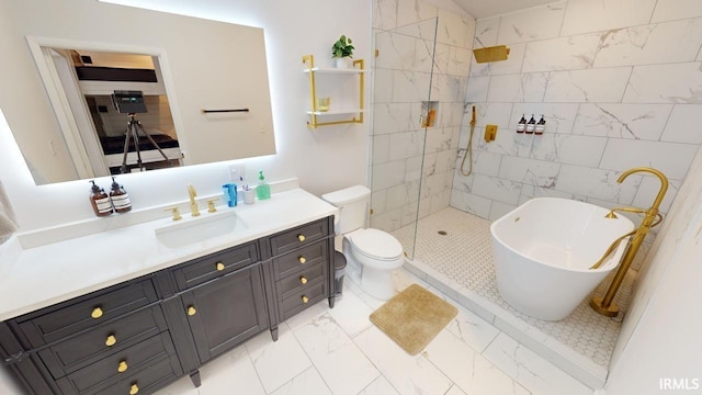 10922 N Lower Lakeshore Dr, Monticello, IN 47960 - bathroom featuring marble finish floor, toilet, vanity, a freestanding bath, and a walk in shower