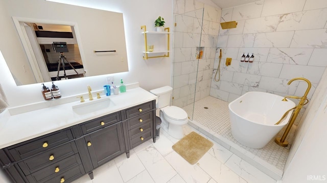10922 N Lower Lakeshore Dr, Monticello, IN 47960 - bathroom featuring vanity, a freestanding tub, toilet, marble finish floor, and walk in shower