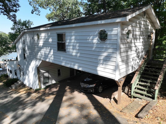 10922 N Lower Lakeshore Dr, Monticello, IN 47960 - view of home's exterior featuring stairs