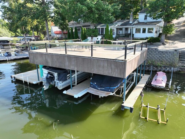 dock area featuring a water view