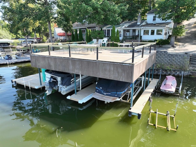 10922 N Lower Lakeshore Dr, Monticello, IN 47960 - view of dock with boat lift and a water view