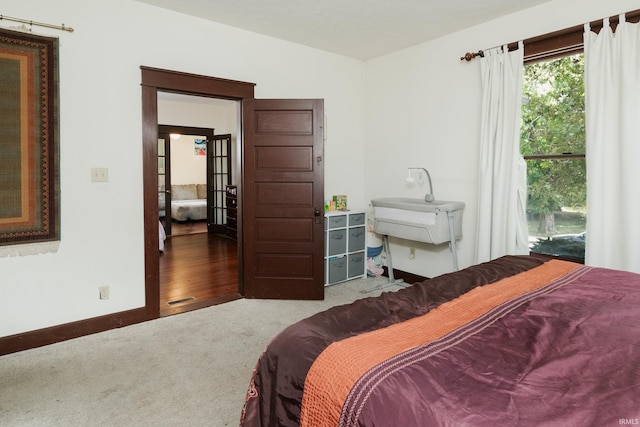 bedroom featuring hardwood / wood-style floors