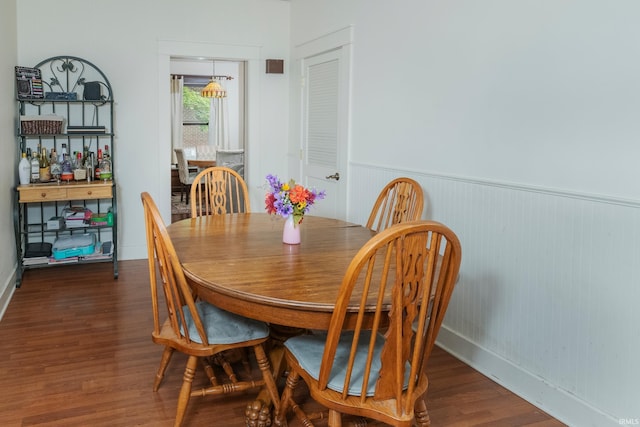 dining room featuring dark hardwood / wood-style flooring