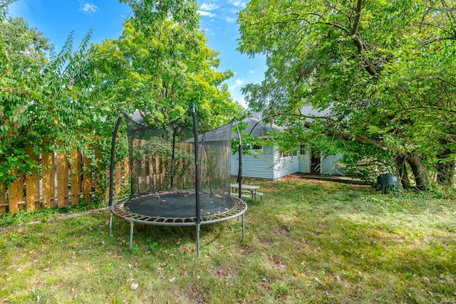 view of yard with a trampoline