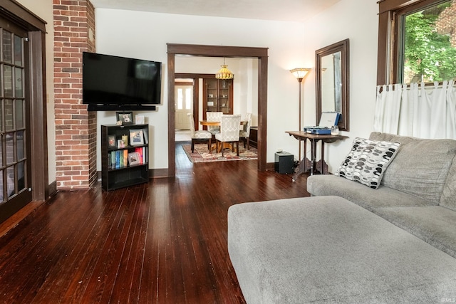 living room with dark hardwood / wood-style floors